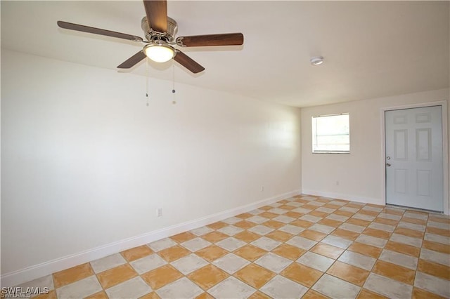 spare room featuring ceiling fan