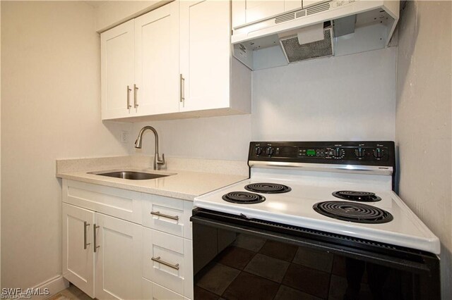 kitchen featuring white cabinetry, electric range, sink, light stone countertops, and ventilation hood