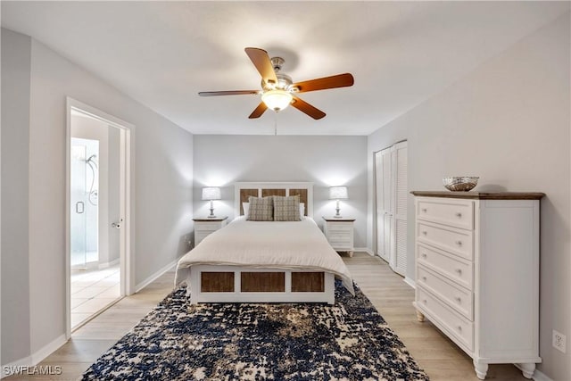 bedroom with light hardwood / wood-style flooring, a closet, and ceiling fan