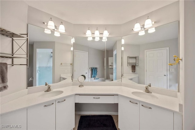 bathroom featuring vanity and walk in shower