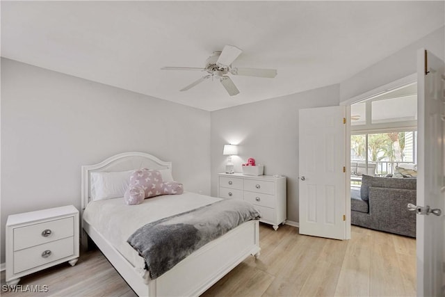 bedroom featuring ceiling fan and light wood-type flooring