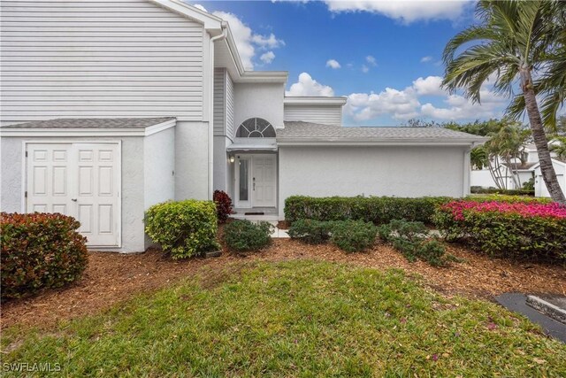 exterior space featuring a front lawn