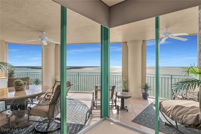 sunroom with a water view