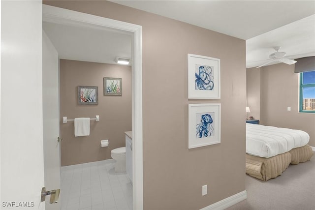 bathroom with ceiling fan, vanity, and toilet