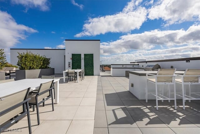 view of patio with grilling area and exterior kitchen