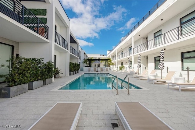 view of pool with a patio area