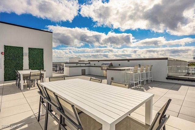 view of patio with grilling area and exterior kitchen