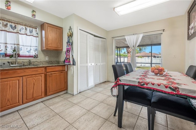 dining space featuring sink