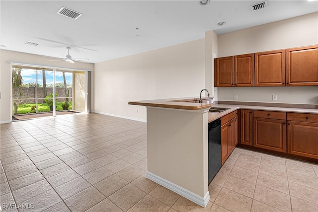 kitchen featuring kitchen peninsula, ceiling fan, sink, light tile patterned floors, and dishwasher