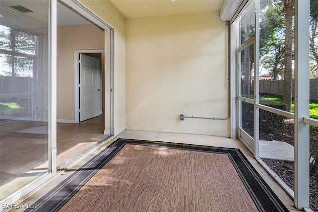 view of unfurnished sunroom