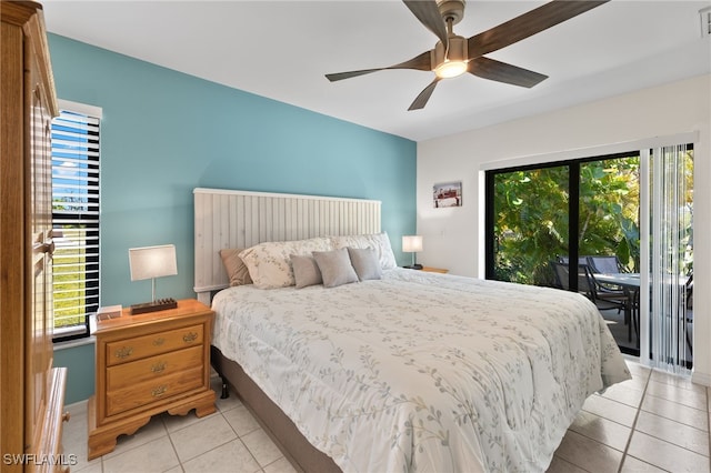 bedroom with ceiling fan, light tile patterned floors, and access to outside