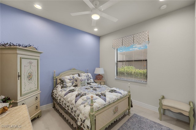 tiled bedroom with ceiling fan