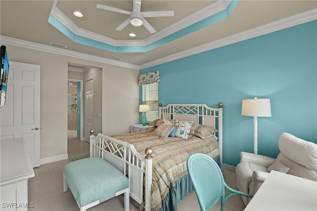 bedroom featuring ceiling fan, a raised ceiling, and ornamental molding