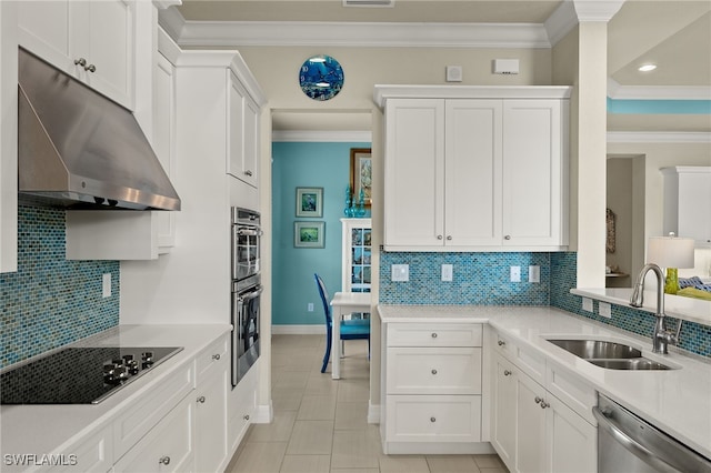 kitchen featuring white cabinetry, sink, and appliances with stainless steel finishes