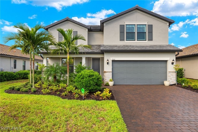 view of front of property with a garage