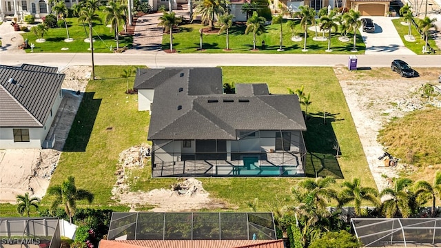 birds eye view of property with a residential view