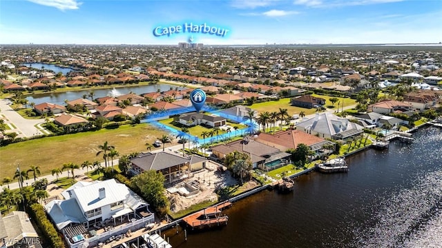 aerial view featuring a residential view and a water view