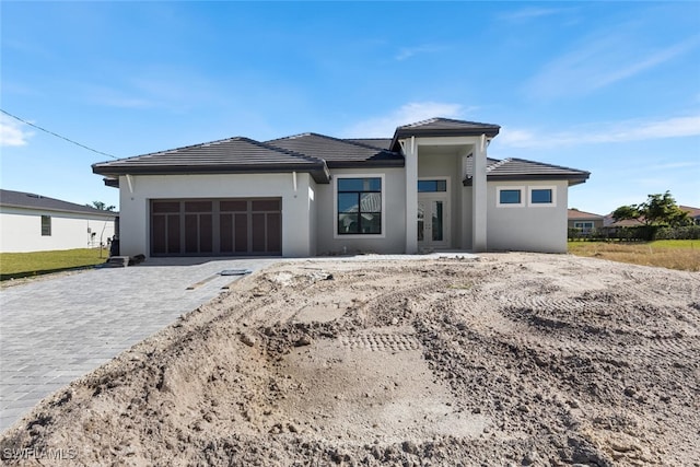 prairie-style house with a garage