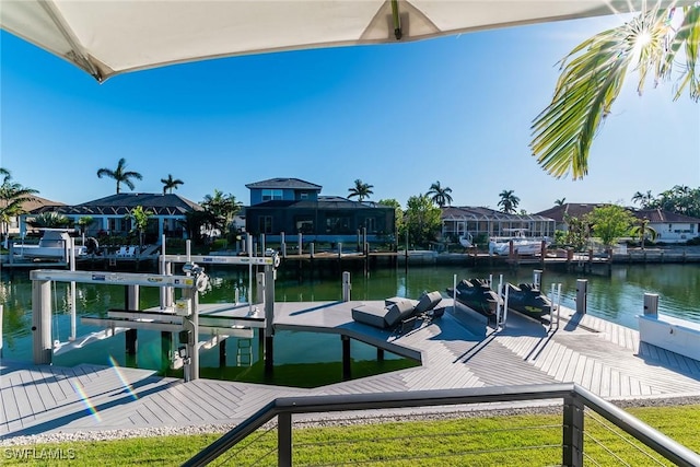 dock area with a water view