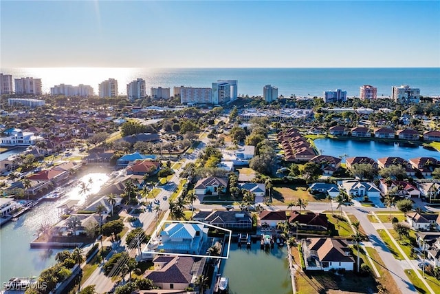 drone / aerial view featuring a water view