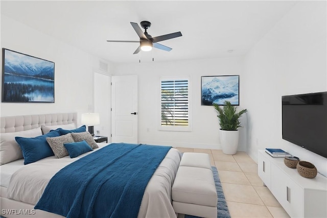 bedroom featuring ceiling fan and light tile patterned floors