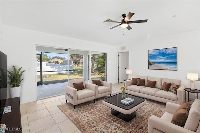 tiled living room with ceiling fan