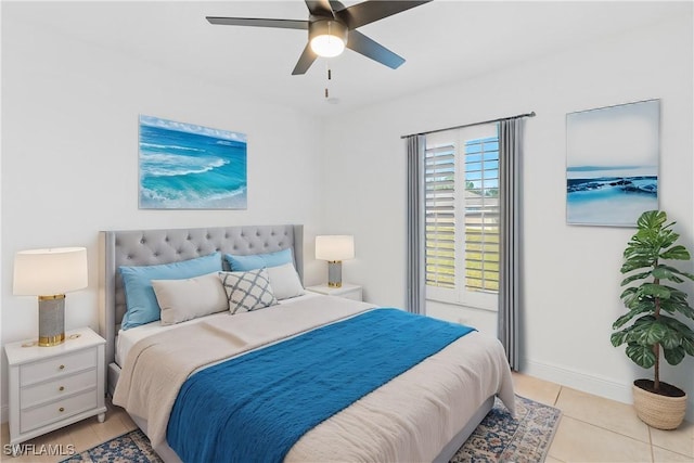 bedroom featuring light tile patterned floors and ceiling fan