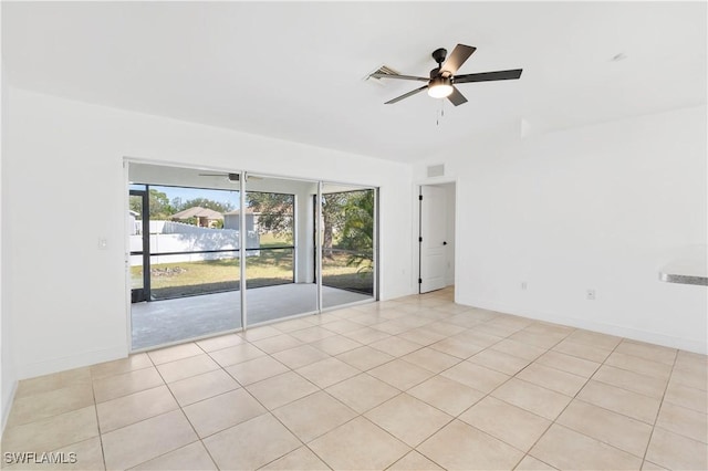 tiled empty room with ceiling fan