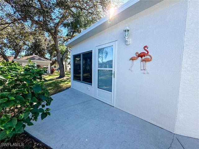 view of home's exterior featuring a patio