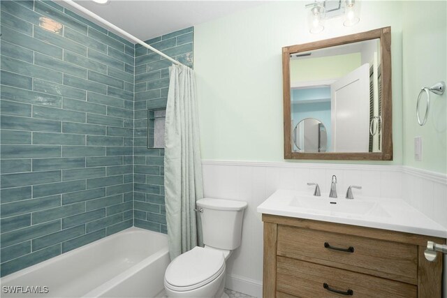 full bathroom with vanity, toilet, and shower / bathtub combination with curtain