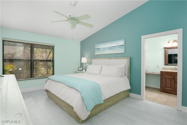 bedroom with connected bathroom, ceiling fan, and vaulted ceiling