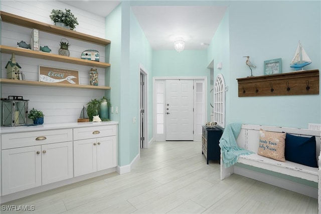 hallway with light wood-type flooring