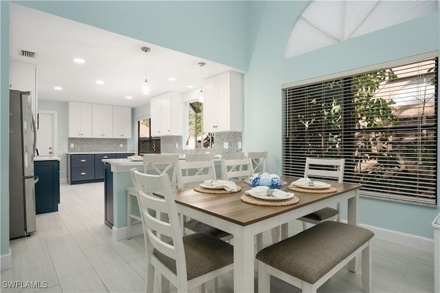 dining room with light tile patterned floors