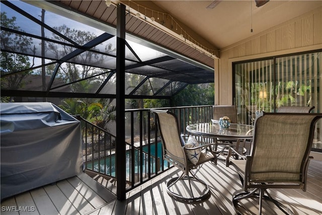 deck with a lanai and grilling area