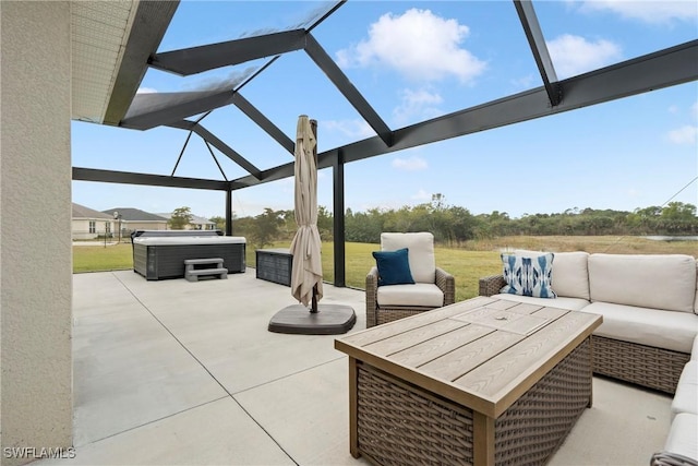 view of patio featuring an outdoor living space, a hot tub, and a lanai