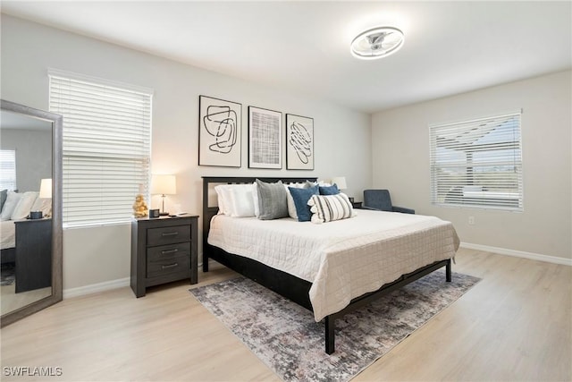 bedroom featuring light hardwood / wood-style flooring