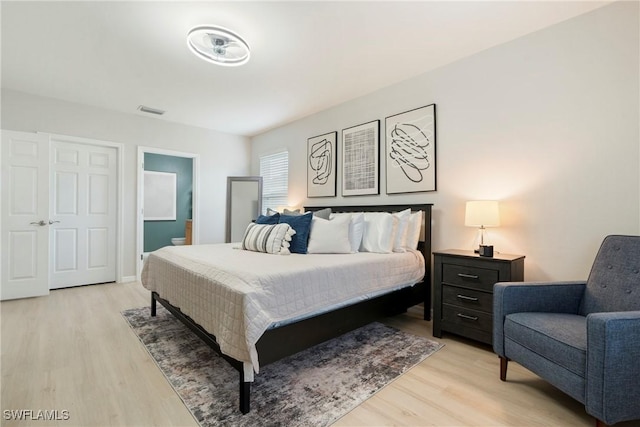 bedroom featuring light hardwood / wood-style flooring