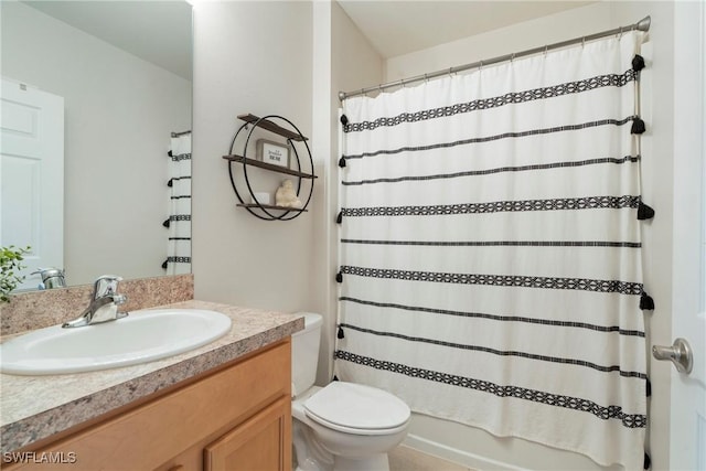 full bathroom with vanity, toilet, and shower / bath combo with shower curtain