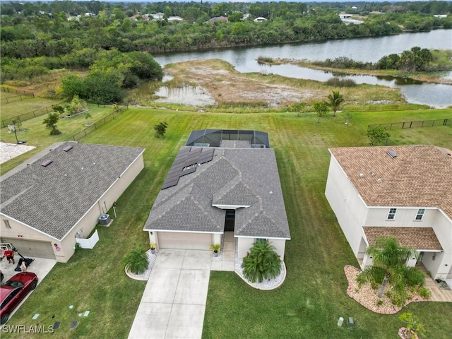 bird's eye view with a water view