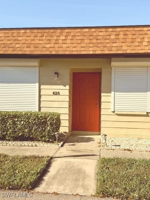 property entrance with a garage