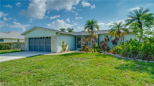 single story home with a front yard and a garage