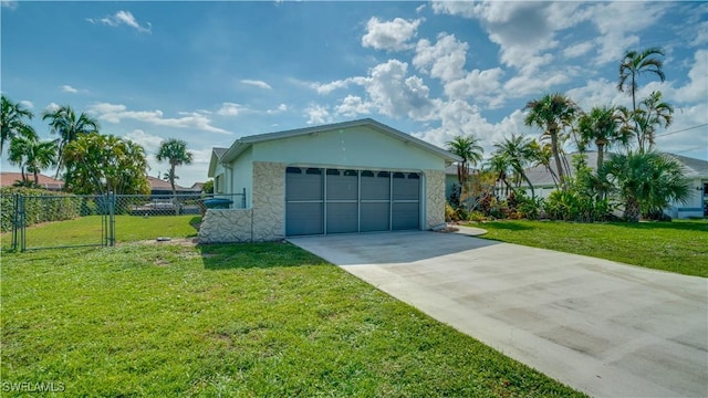 garage with a yard