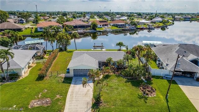 drone / aerial view with a water view