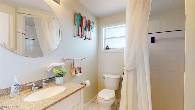 bathroom with a shower with shower curtain, vanity, toilet, and tile patterned flooring