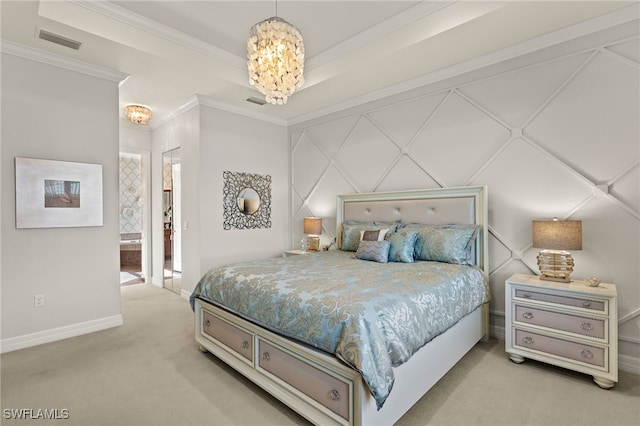 bedroom featuring ensuite bathroom, carpet, crown molding, and a notable chandelier