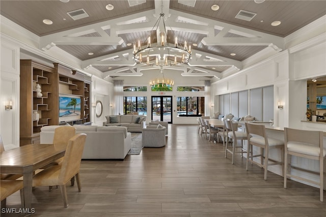 living room featuring hardwood / wood-style flooring, wooden ceiling, a notable chandelier, high vaulted ceiling, and beam ceiling