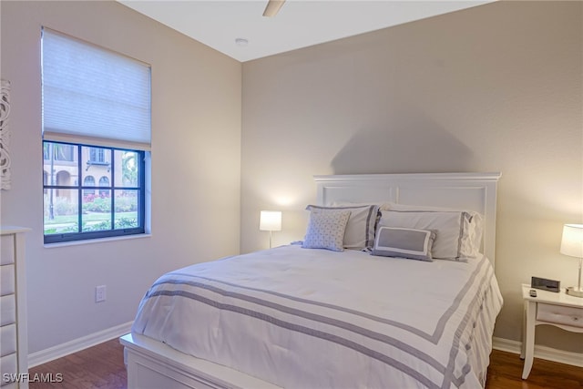 bedroom featuring dark hardwood / wood-style floors and ceiling fan