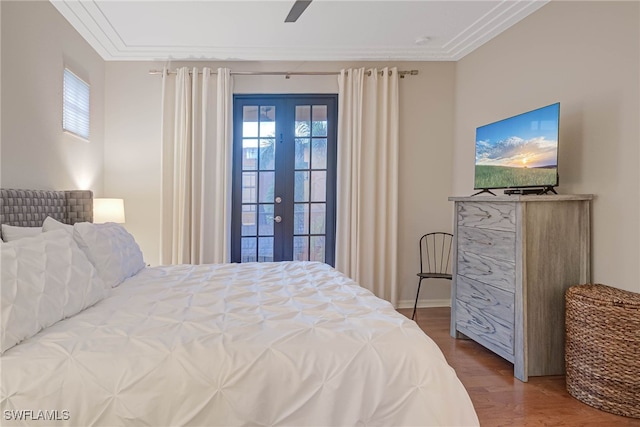 bedroom with french doors, ceiling fan, ornamental molding, and wood-type flooring