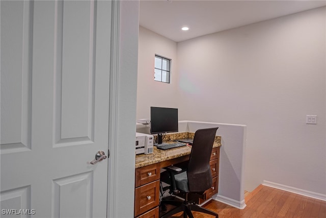 home office featuring light hardwood / wood-style floors