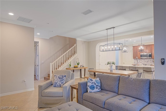 living room with ornamental molding